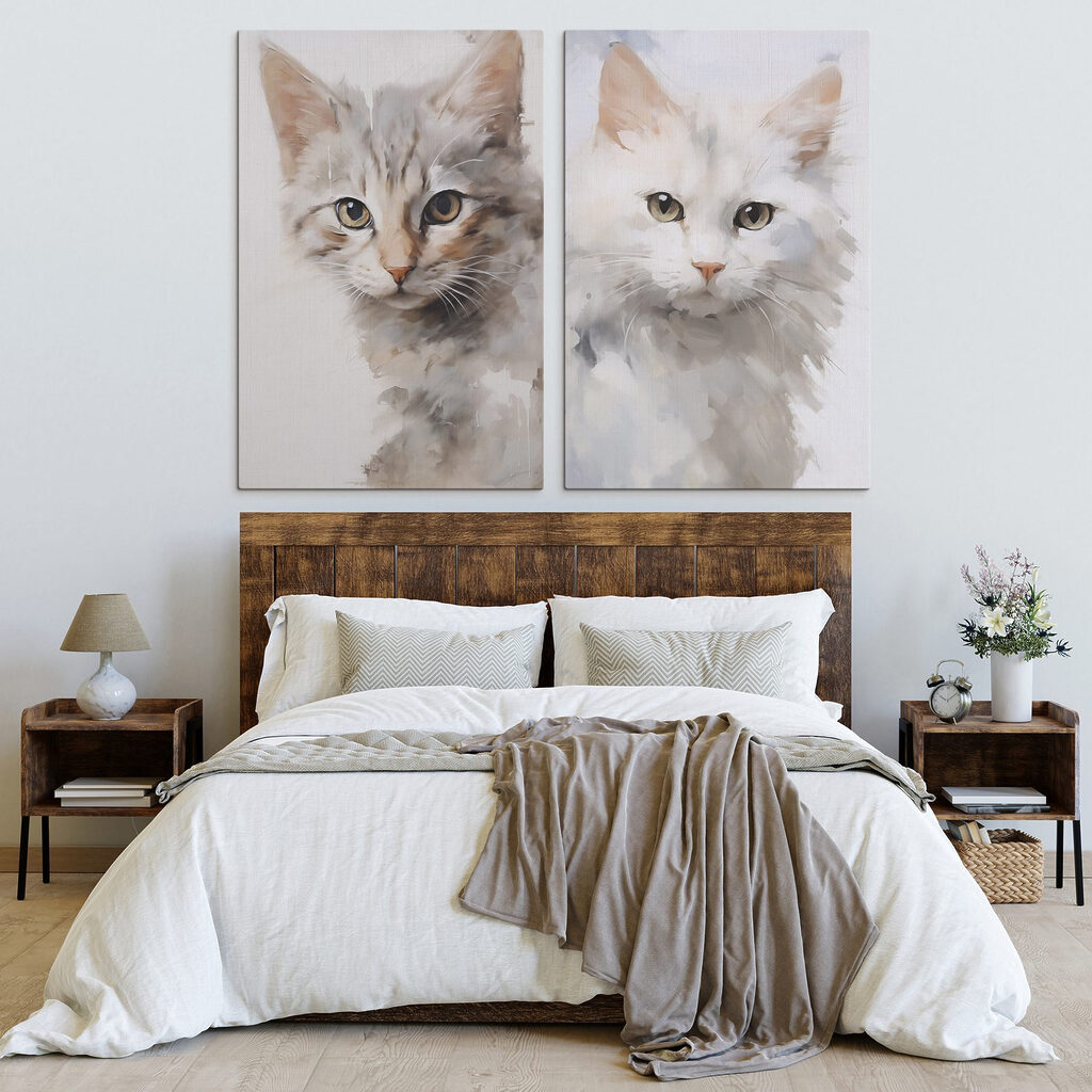 Two cats with their heads turned to the side